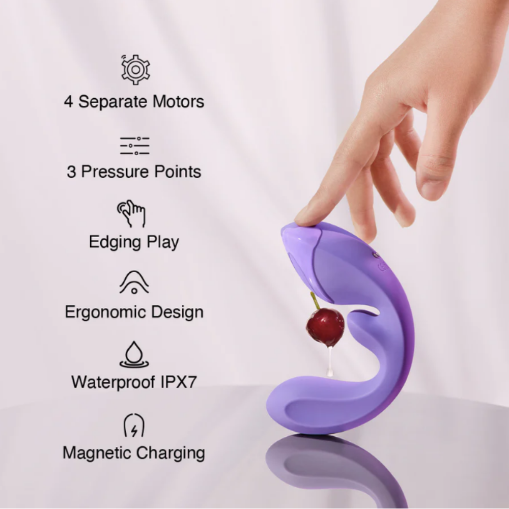 Purple toy with cherry detail held by a hand, featuring text on features.